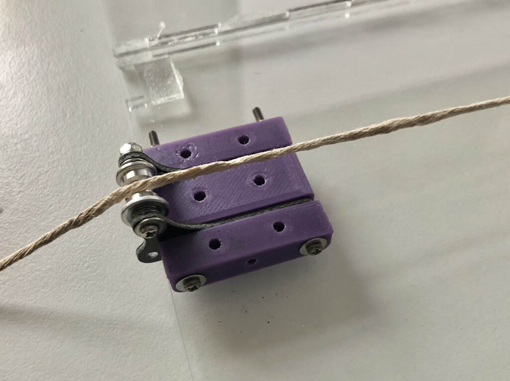 Custom made pulley and rope for Mini 4WD tyre grip measurement setup
