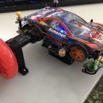 Picture of our Kumamon AI Mini 4WD Mark 8L car on an inertia dyno test